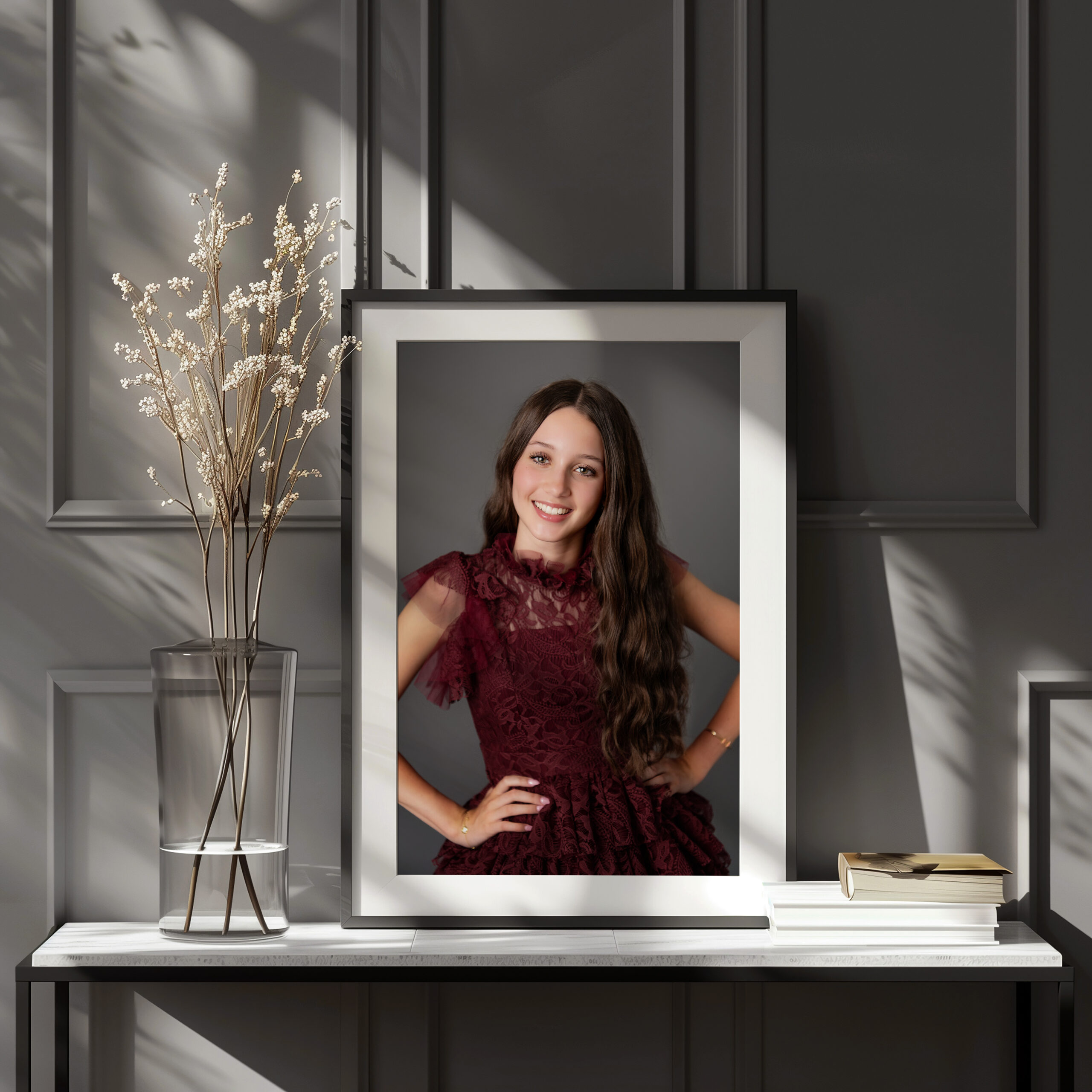 Framed teen portrait displayed as custom wall art in a neutral home interior in Glen Mills, PA.