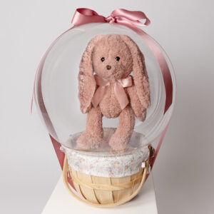 Personalized Baby’s First Easter balloon basket with plush bunny inside clear balloon gift – newborn Easter keepsake for families in Villanova, Wayne, and Glen Mills PA.