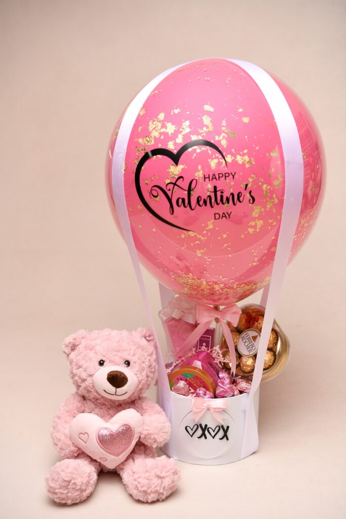 Luxury Valentine balloon gift with chocolates and teddy bear designed for clients in Haverford PA