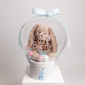 Baby’s First Easter balloon gift with plush bunny and pastel eggs inside clear balloon – personalized newborn Easter gift Glen Mills PA and Philadelphia Main Line.