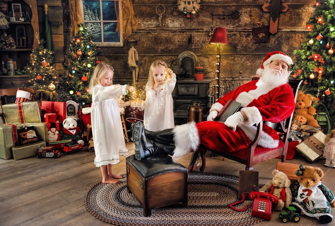 Children discover Christmas magic while Santa rests during an interactive Santa experience near the Main Line.