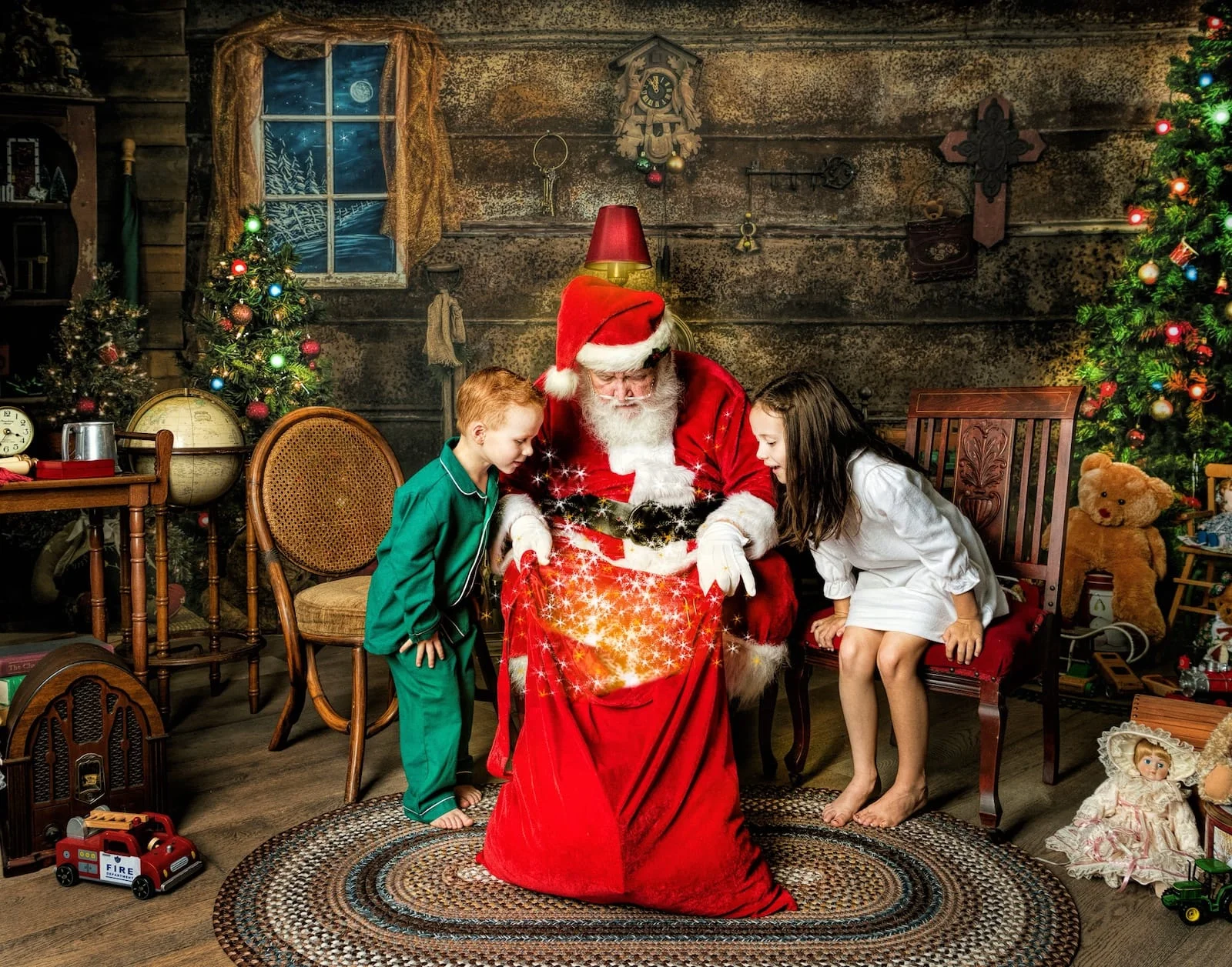 Two children look into Santa’s glowing Christmas bag during an interactive Santa portrait session.